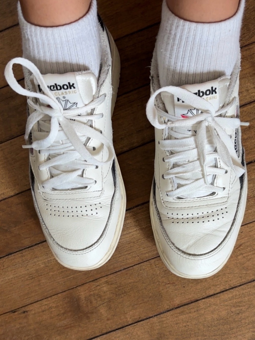 Reebok White Sneakers with Black Side Stripe